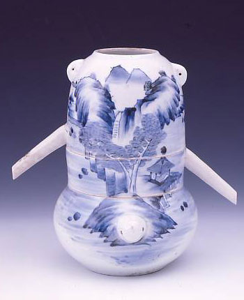 Distiller wuth landscape in underglaze blue